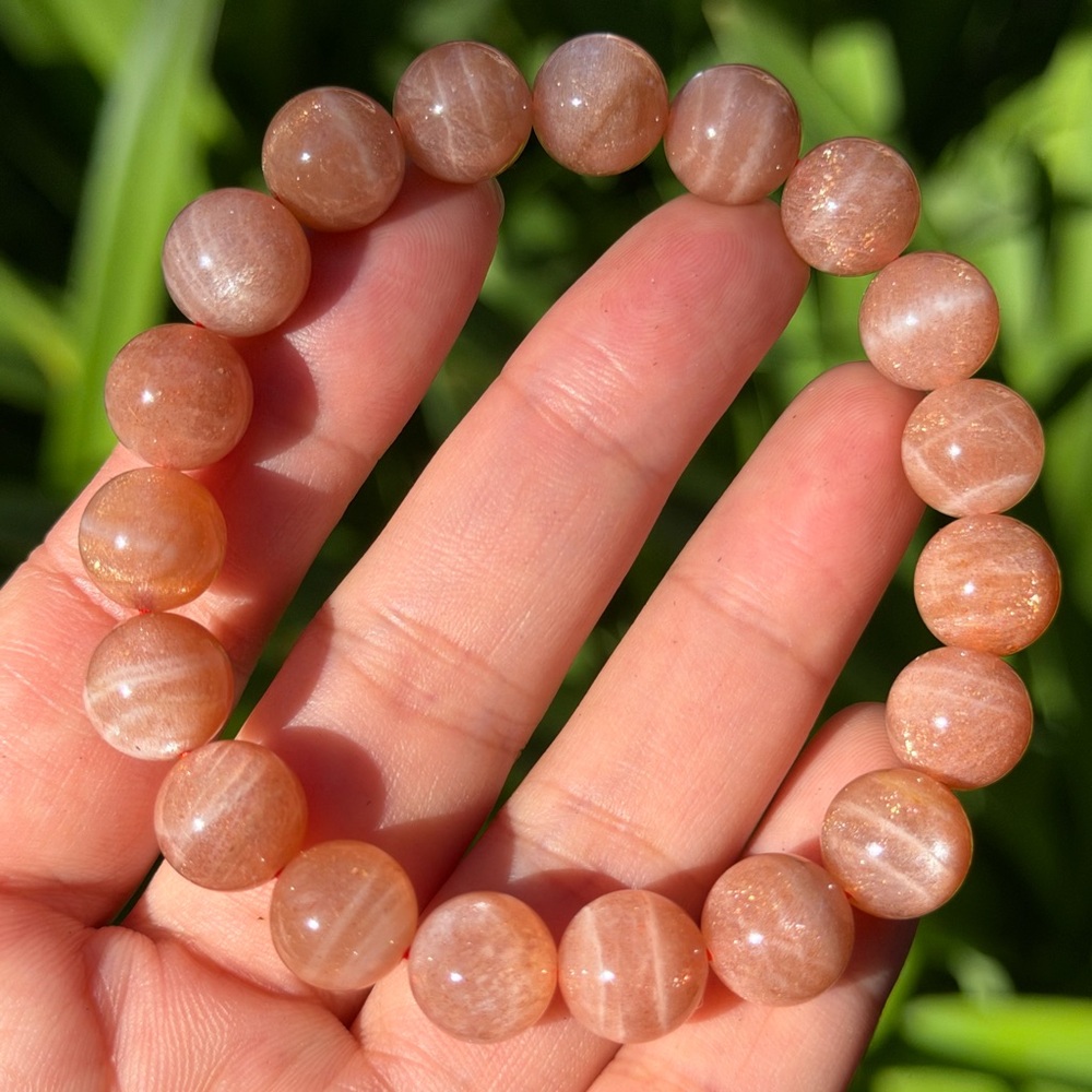 10.5mm‎ flashy peach moonstone bracelet 0406